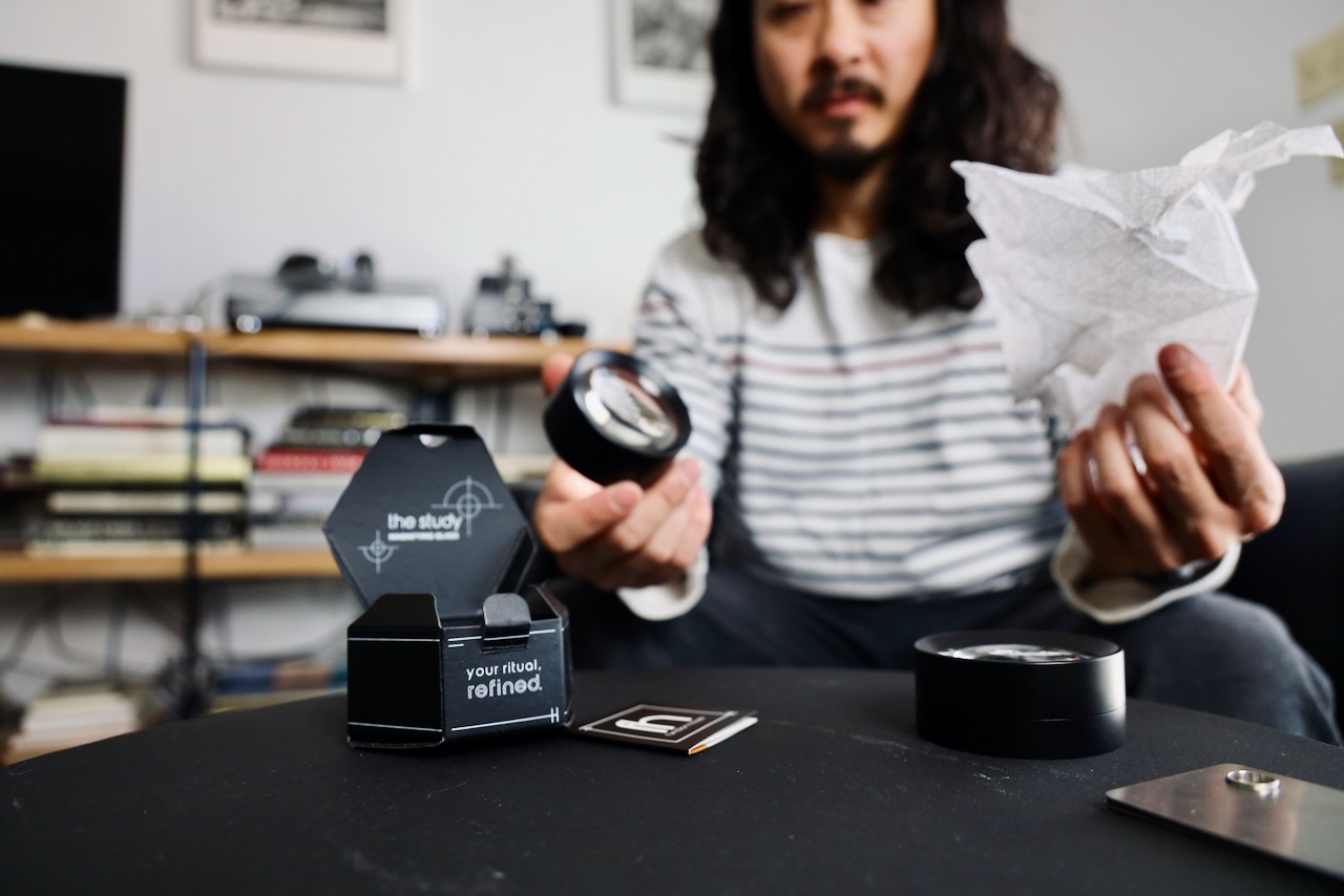 Tyler Lau with magnifying glass